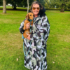 Urban Arctic camo waterproof changing robe with black faux fur hood and hues of olive green, black, white and grey