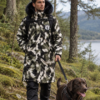 Urban Arctic camo waterproof changing robe with black faux fur hood and hues of olive green, black, white and grey. AI Generated image.