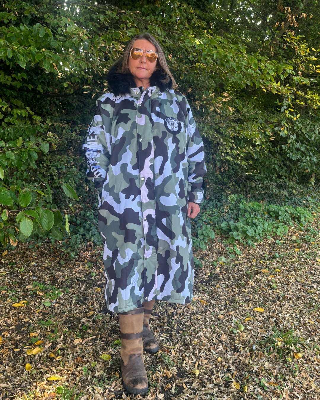 Urban Arctic camo robe with black faux fur hood and hues of olive green, black, white and grey